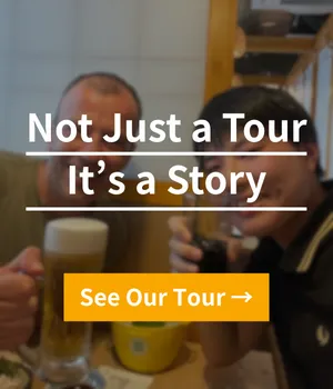 Banner reading Not Just a Tour, It's a Story over two people with beer at a counter, with a See Our Tour button